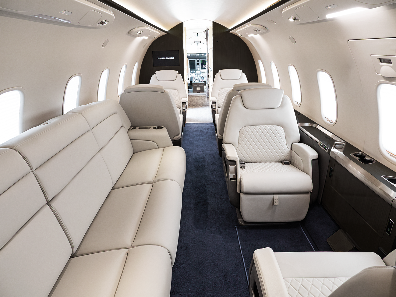 flyExclusive private jet interior refurbishment with premium leather seating