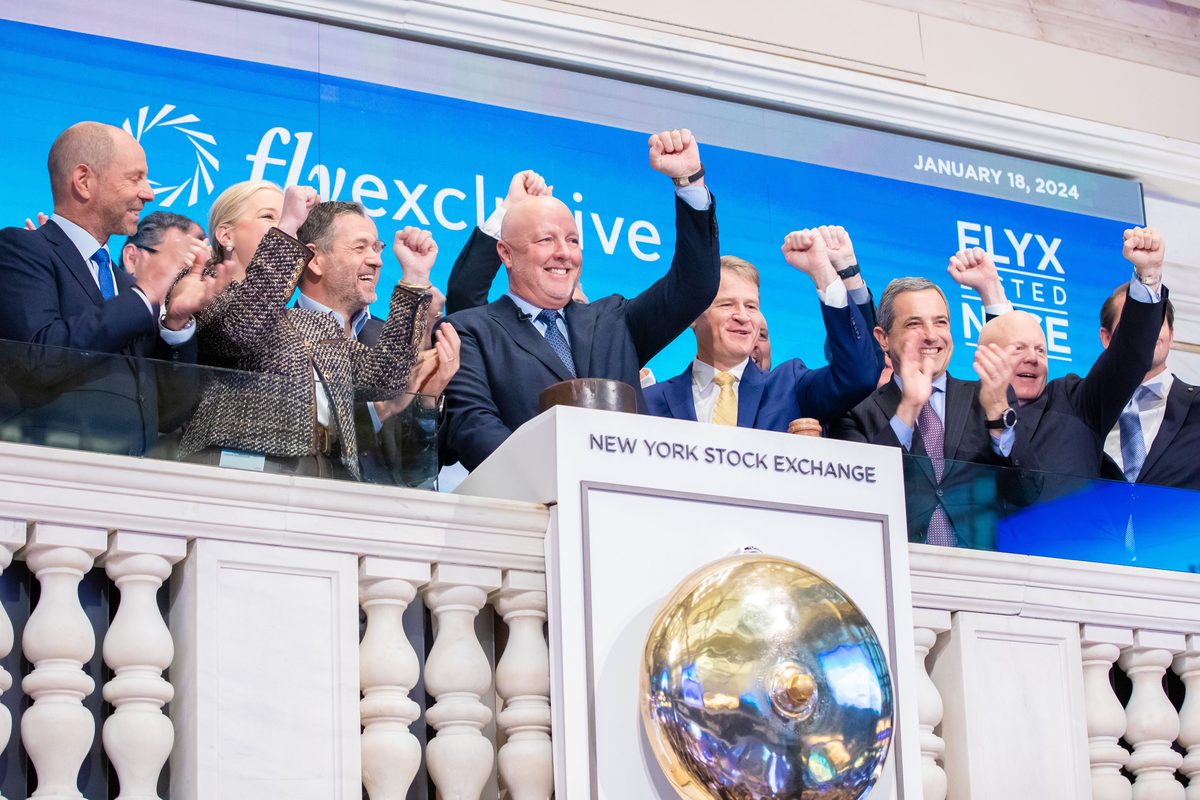 Jim Segrave and the flyExclusive team ringing the opening bell at the New York Stock Exchange for the FLYX listing