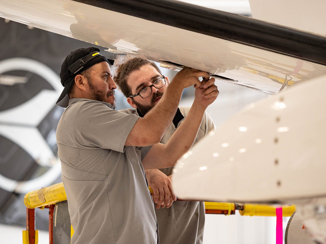 flyExclusive maintenance technician on the ramp with diagnostic equipment